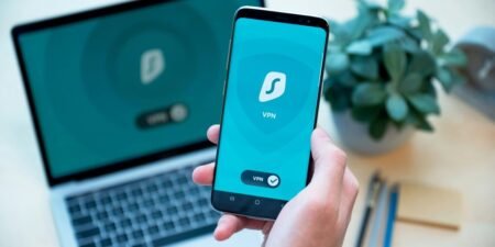 person holding black iphone 4